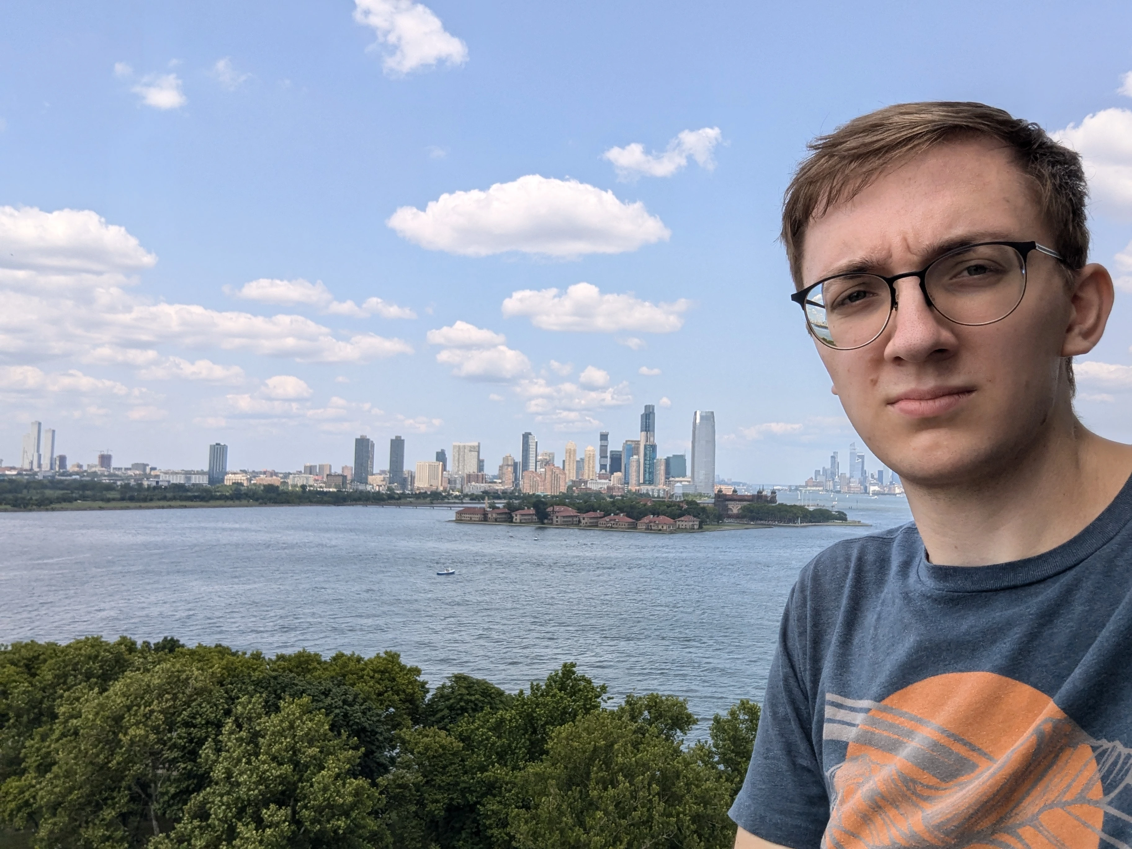 A picture of me in fron of Manhattan, ish